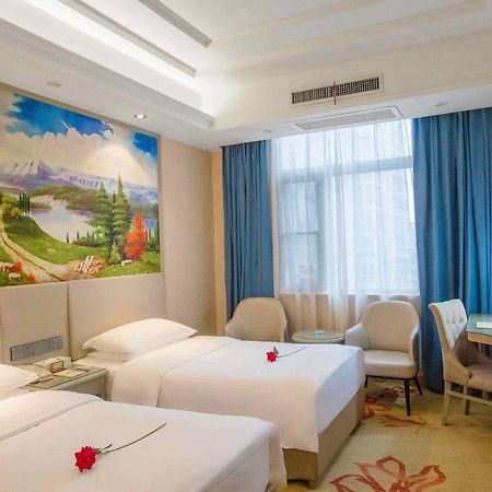 Vienna Hotel Nanyang People Road Bagian luar foto