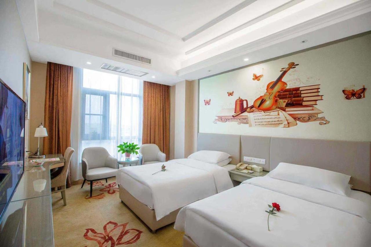 Vienna Hotel Nanyang People Road Bagian luar foto